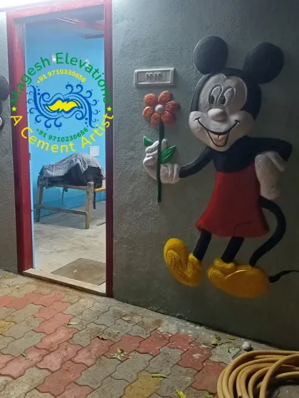 To show my range, here is a fun, colorful 3D cement sculpture of Mickey Mouse for a client's home. I can bring any idea or character you have in mind to life, whether it is traditional or modern.