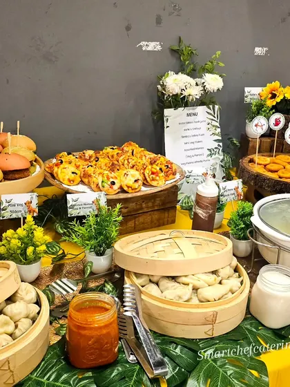 Another angle of our Lion King-themed grazing table, showcasing the variety of kid-friendly foods like mini pizzas, nuggets, and colorful sliders, all arranged beautifully.