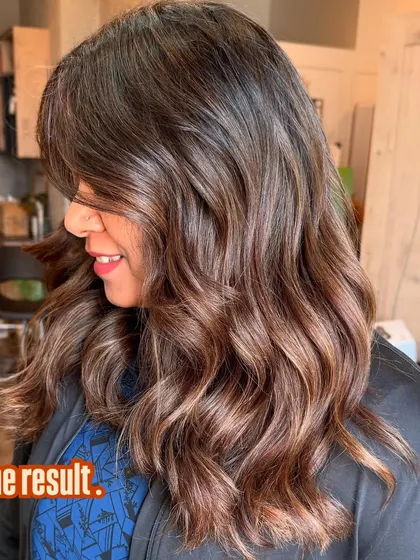 Here's the stunning result of a terracotta balayage. The blend is seamless, giving the hair a warm, dimensional glow that looks natural and vibrant.
