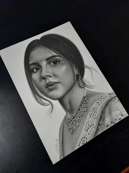 A practice sketch of actress Kalyani Priyadarshan. I spent around 8 hours on this A4 portrait, focusing on achieving a hyper-realistic look with graphite pencils.
