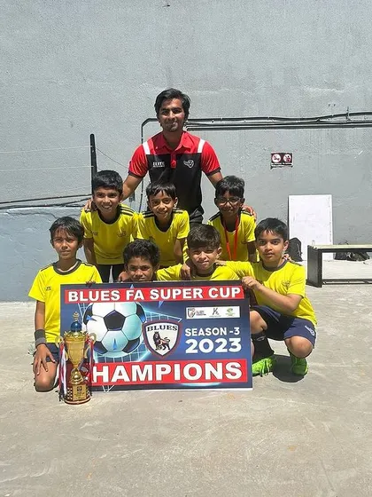 The U8 championship team photo after winning the Blues FA Super Cup.