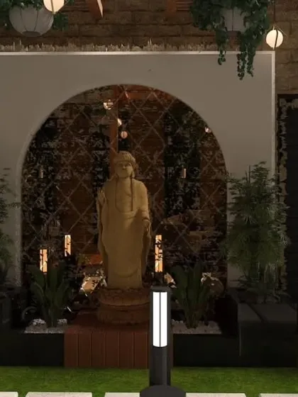 A proposed design for a spiritual corner in Bulandshahr. The render shows a Buddha statue set within a stone-clad arch, illuminated by modern bollard lights.