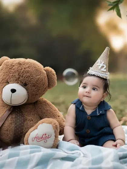 Celebrating the half-way mark! This outdoor half-birthday session with a teddy bear and bubbles is a wonderful way to capture your baby's sitter milestone.