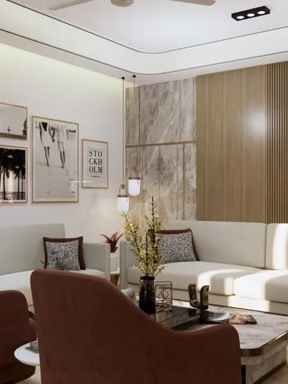 This view shows the complete living area layout, with an L-shaped sofa and accent chairs providing plenty of seating. A gallery wall adds a personal touch to the modern and warm space.
