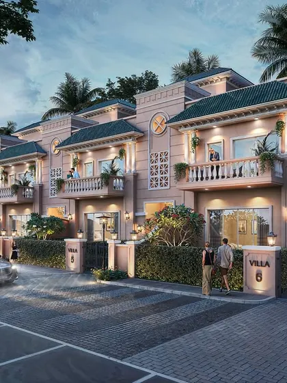 An evening view of the ATS Merigold villa project. The rendering captures the classic architectural details, with warm light spilling from the windows and illuminating the entryway, creating a sense of luxury and arrival.