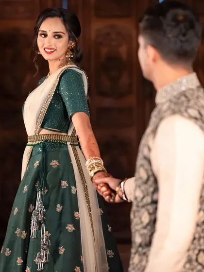 A candid moment from a pre-wedding event. The bride's natural, happy expression is the focus, enhanced by a simple and elegant makeup look.