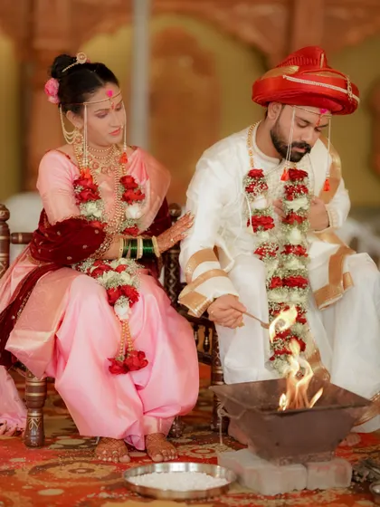 A key moment in the wedding ceremony, as the couple participates in the sacred fire ritual. I ensure these important traditions are beautifully documented.