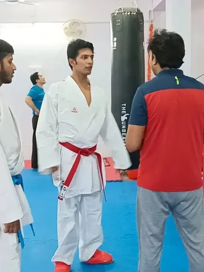 Instructors discussing techniques with Pranay Sharma during the seminar. We believe in constantly upgrading our own skills as coaches.