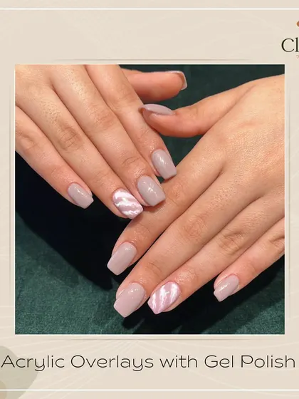 Back to basics with a subtle pastel nude. These acrylic overlays with a hint of marble art are a popular choice for a chic and understated look.