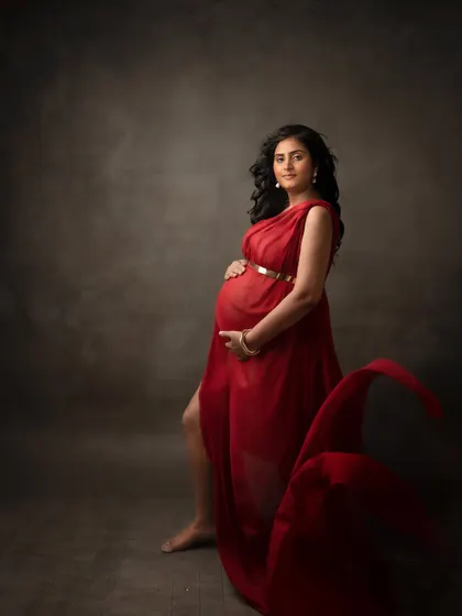 Another beautiful take on the flowing red gown, this time with a softer, more introspective mood.