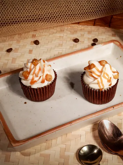 Another look at our Salted Caramel Cupcakes, showcasing the rich caramel drizzle and crunchy toppings that make them so irresistible.