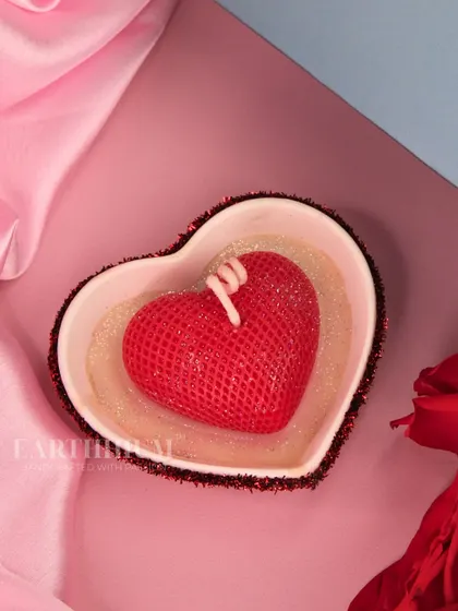 This textured red heart candle is a bold and beautiful way to show someone you care. It's a simple gesture of warmth and affection.