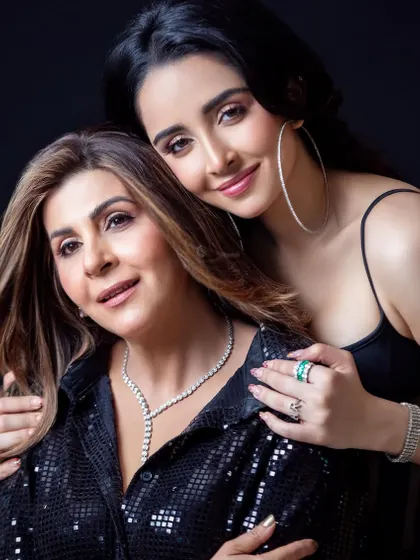 A warm and loving portrait of Beena and Ahana Raheja, showcasing their bond and the beautiful jewellery.
