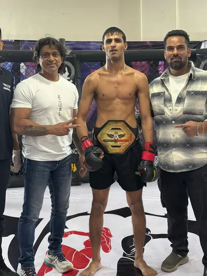 And the new Undisputed Bantamweight Champion. Nilesh Choudhary with the belt he earned through relentless hard work. This is the goal, and we help you achieve it.