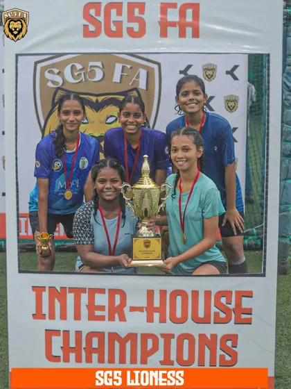 Our SGS Lionesses lifting the Inter-House Champions trophy. This victory highlights the incredible talent and competitive drive within our girls' football program.
