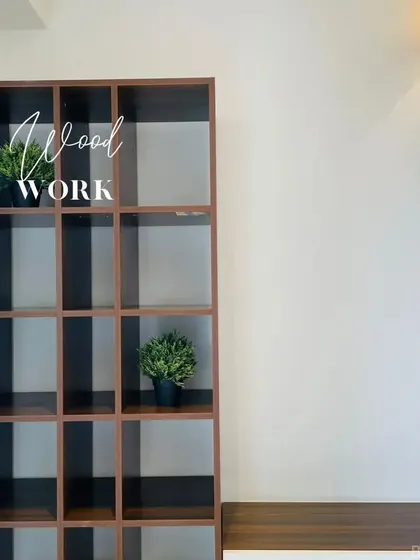 We offer amazing options in woodwork. This open-shelf wooden bookcase provides a versatile storage and display solution with a modern grid design.