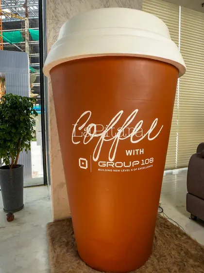 We fabricated this giant, larger-than-life coffee cup prop with the event branding. It served as a major photo-op and a landmark within the event space.