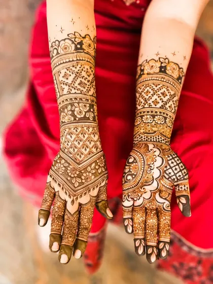 The palm view of the same design, featuring a different set of intricate floral and paisley patterns.