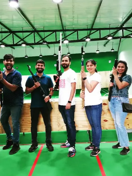Another happy group after a fun shooting session. I love seeing people get excited after they try hitting the target for the first time. It's a great stress buster.