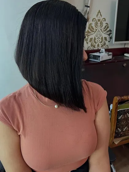 The shorter side of the asymmetrical bob.