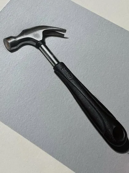 A finished realistic drawing of a hammer. I used a mix of markers and colored pencils to render the shiny metal head and the matte rubber handle.