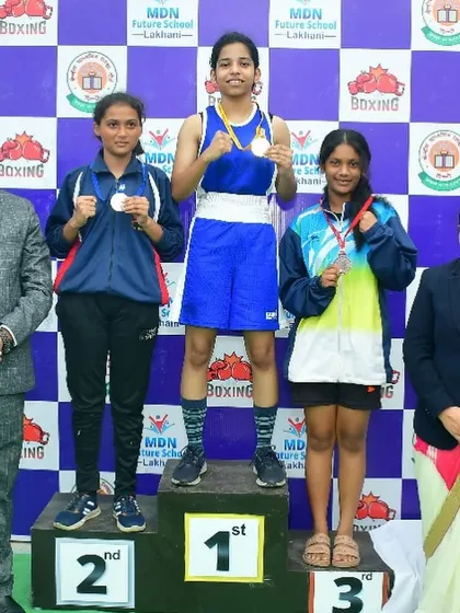 Jignasha on the podium after winning gold at the CBSE School Games.