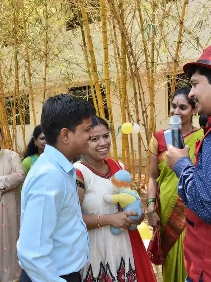 Sharing a fun moment with a family during a birthday celebration. I enjoy involving parents and children together in the activities.