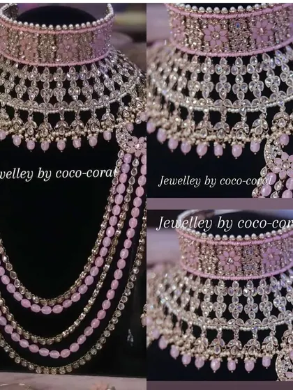 Another view of the modern pink and silver-toned choker and layered necklace set. This rental is perfect for a glamorous party look.
