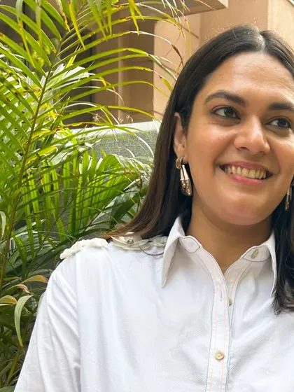 A close up on the floral shoulder detail of the Stitch Stories white shirt. I always focus on these unique design elements that make a piece special.
