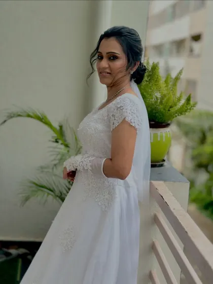My lovely Christian bride, looking serene and elegant on her wedding day. I focused on a natural, glowing makeup look to enhance her features and complement her beautiful white gown.