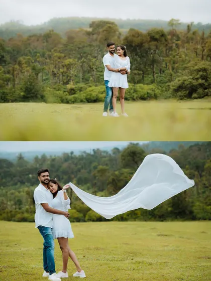 A romantic shot of a couple with a flowing white cloth in a green landscape. The movement of the fabric adds a touch of elegance and dynamism to the photo.