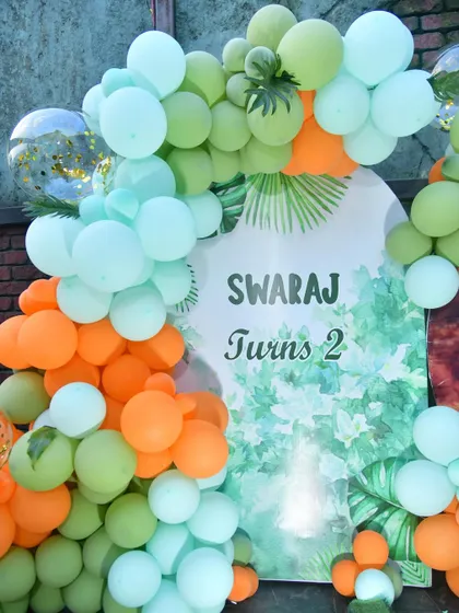 A U-shaped panel backdrop for a jungle-themed party, personalized with the birthday boy's name.