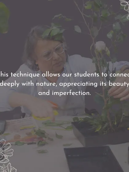 A student trims branches for her Ikebana piece. This technique allows for a deep connection with nature, appreciating its beauty and imperfection.
