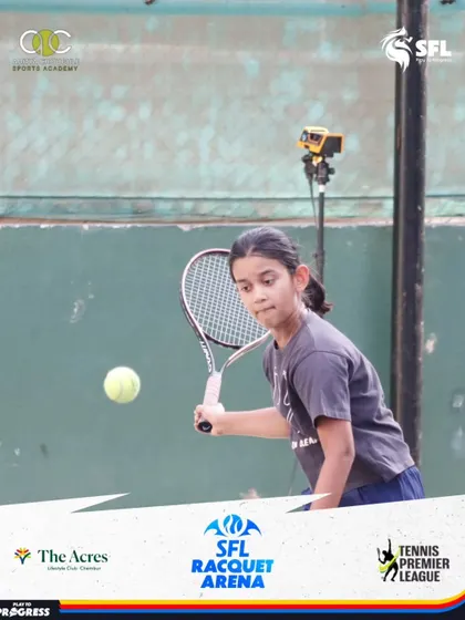 Eyes on the ball. A young athlete connects with a forehand during a training session, showing the results of our dedicated coaching and her hard work.