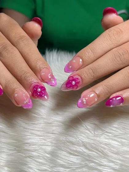 This vibrant magenta set features a "blush" effect, where the color is concentrated in the center, and is accented with 3D flowers and pearls.