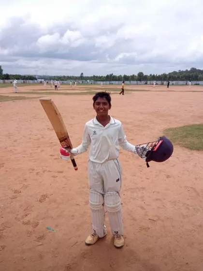 Celebrating a young champion. Here is U-14 player Bilal after scoring a fantastic run-a-ball century. This kind of performance at a junior level shows immense potential and a hunger for runs.