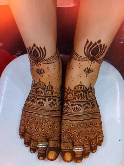 Your bridal henna isn't complete without beautiful designs for your feet. I create intricate patterns that look like stunning jewelry, from delicate anklets with lotus motifs to full coverage that complements your hand henna perfectly.