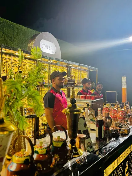The full coffee bar setup, illuminated to create a warm and inviting atmosphere.