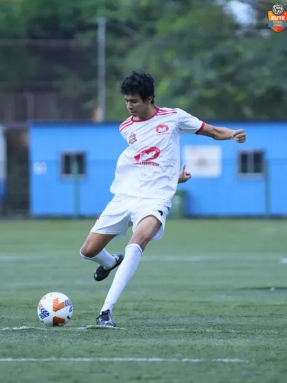 A player executes a clean pass, a simple action that is the foundation of our teamwork.