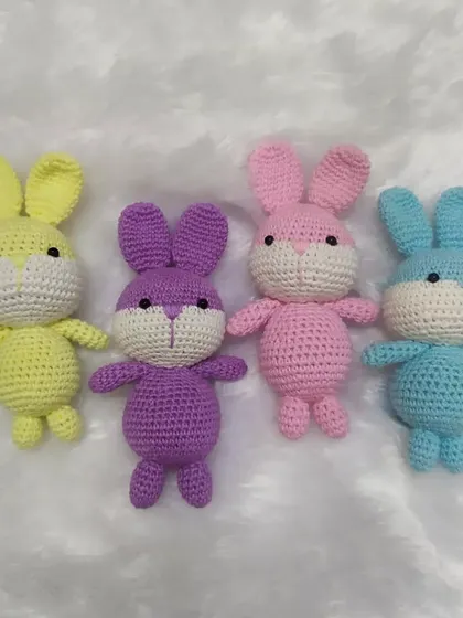 A rainbow of crochet bunnies! These were made to order in four different pastel colors. They are simple, sweet, and filled with lots of love.