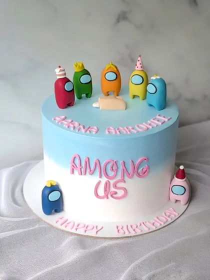 Is there an imposter among us? This fun Among Us cake features a colorful crew of characters, perfect for a gaming-themed birthday party.