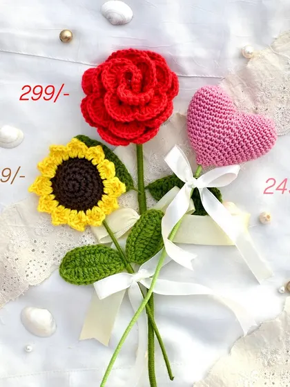 A trio of our most popular flowers: the classic red rose, the cheerful sunflower, and the sweet pink heart. Each one is handmade and full of character.
