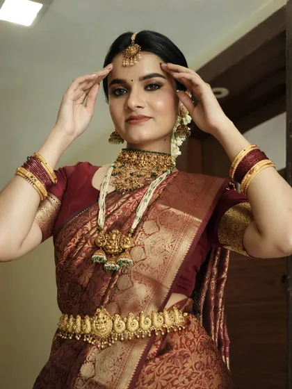 A beautiful portrait showing the bride's confidence and the perfection of her makeup. The look is both traditional and modern.