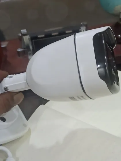 A side profile of a modern bullet camera, showing its sleek and durable housing designed for outdoor use.