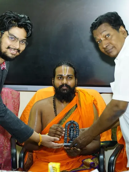 Being presented with a memento during the award ceremony at Andhra University. This honor recognizes my efforts to revive the cultural heritage of Dhanurvidya.