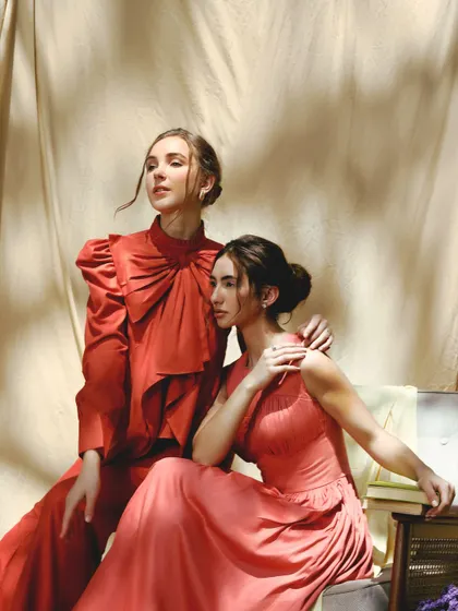Two models, one cohesive vision. I created complementary soft glam looks for this shot, using warm, rosy tones to tie their makeup together and create a harmonious, dreamy image.