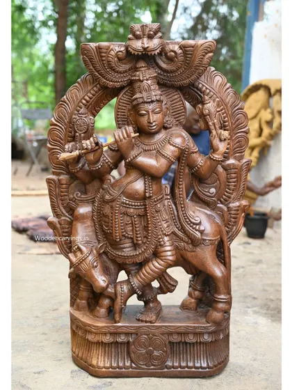 A full view of the 36-inch four-armed Krishna, showing the complete sculpture with its ornate arch and base.