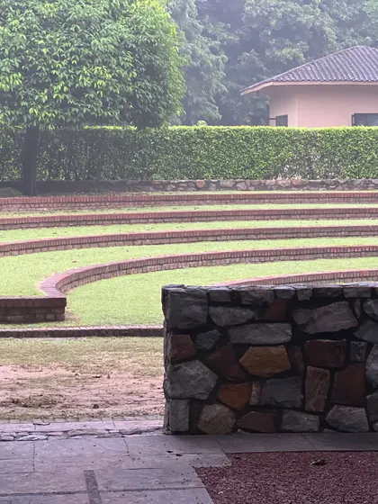 The tranquil, stepped amphitheater at our weekend retreat venue. This peaceful setting provides a perfect backdrop for outdoor talks and quiet contemplation.