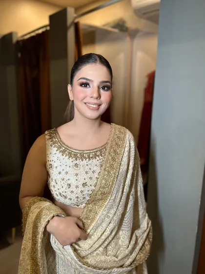 Karwachauth special. A beautiful, soft glam look for the festive day, featuring a sleek ponytail and glowing makeup.
