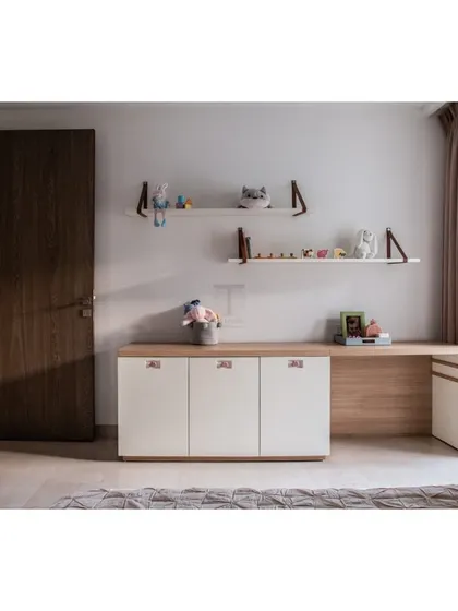 This custom study unit and storage cabinet was designed to be both functional and fun. The clean lines and natural wood tones are paired with cute handles and open shelves for displaying toys and treasures.